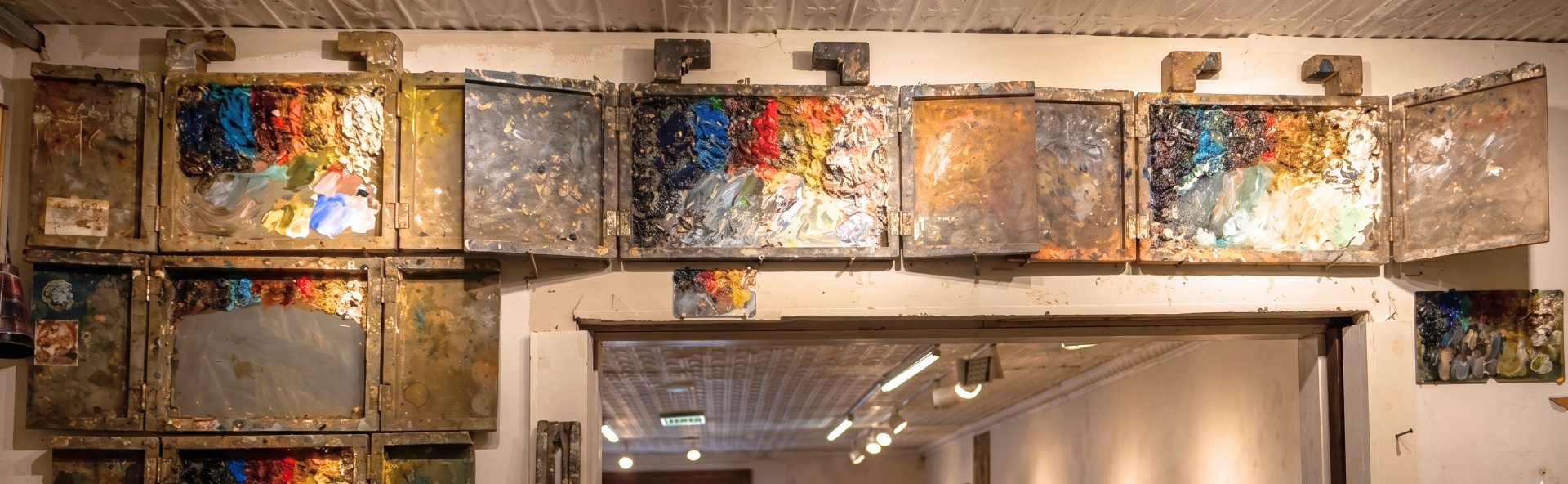 Justin Vining's collection of well-used artist palettes